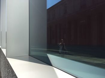 Woman walking in modern building