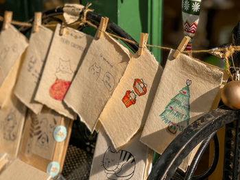 Close-up of clothes hanging for sale