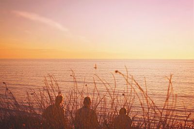 Scenic view of sea at sunset