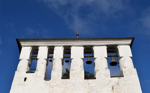 Low angle view of built structure against blue sky