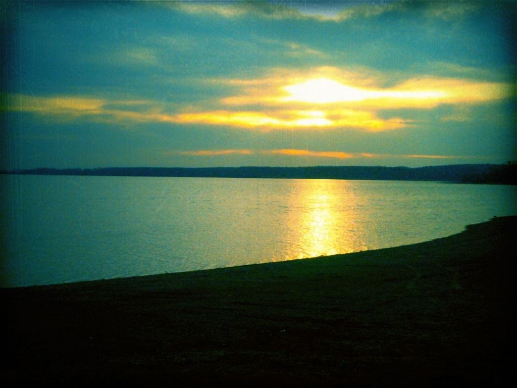 sunset, water, tranquil scene, scenics, tranquility, beauty in nature, sky, sea, reflection, horizon over water, idyllic, nature, sun, silhouette, lake, cloud - sky, calm, cloud, orange color, shore