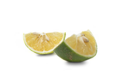 Close-up of fruits against white background