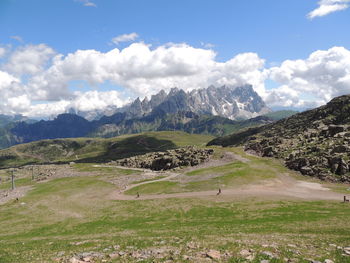 Scenic view of landscape and mountains against sky