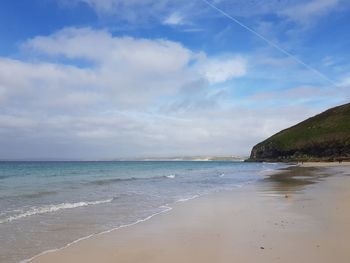 Scenic view of beach against sky