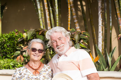 Portrait of senior couple standing outdoors