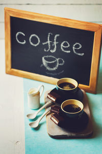 Close-up of coffee cup on table