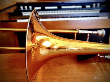 Close-up musical instruments in the conservatory - trombone and portable organ