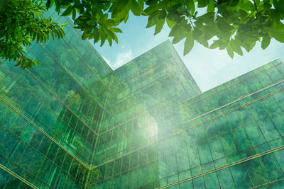 Low angle view of skyscraper against sky