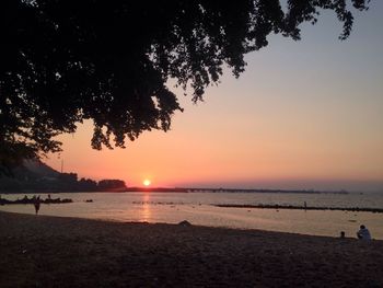 Scenic view of beach during sunset