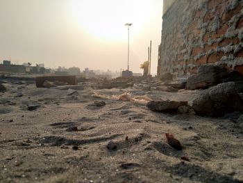 Surface level of street by buildings against sky