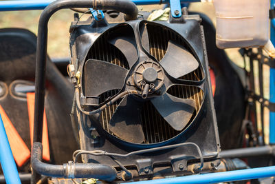 Radiator fan modified car buggy car mounted on the rear of the car.