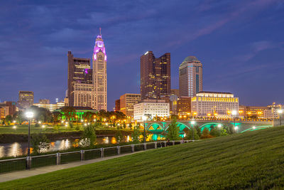 Illuminated buildings in city at night