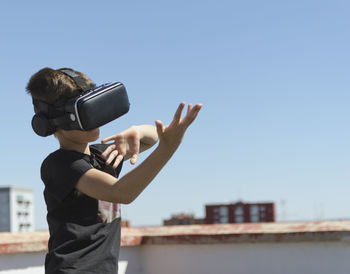 Virtual reality experience young man having a funny moment