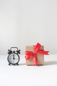 Close-up of christmas presents against white background