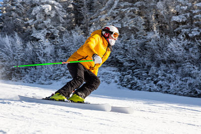Man skiing on snowy slope