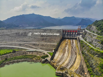 Scenic view of dam against sky