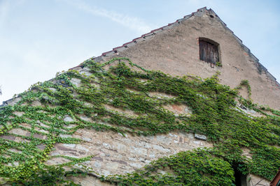 Low angle view of old building against sky