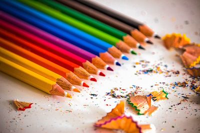 High angle view of multi colored pencils on table