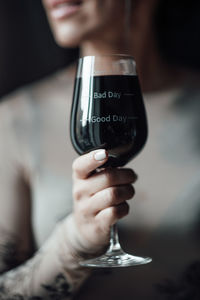 Close-up of woman hand holding drink