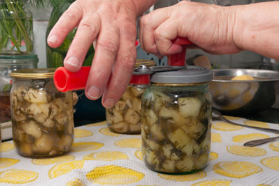 Midsection of man preparing food on table