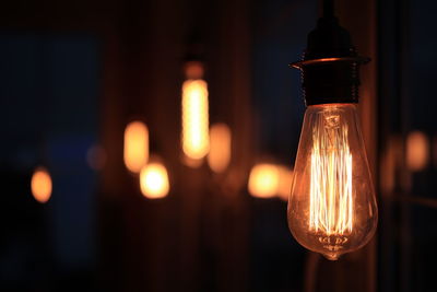 Close-up of illuminated light bulb