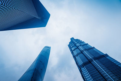 Low angle view of modern buildings against sky