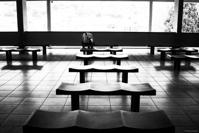 Empty chairs and table in restaurant