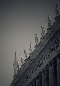 Low angle view of statue against sky