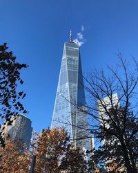 Low angle view of skyscraper against clear sky