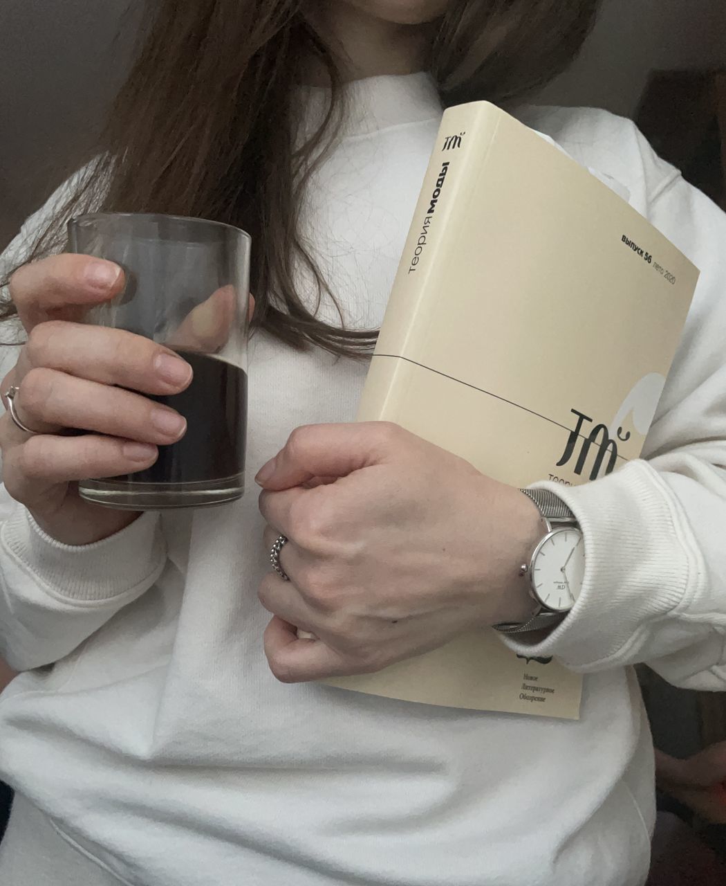MIDSECTION OF WOMAN DRINKING COFFEE CUP WITH TEXT