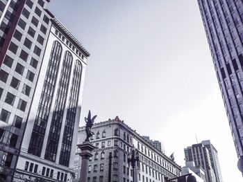 Low angle view of modern building against clear sky