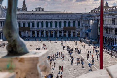 Group of people in front of historical building