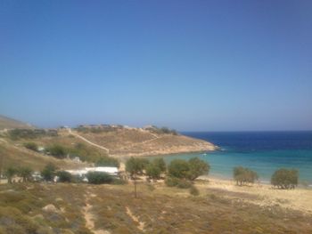 Scenic view of calm sea against clear sky