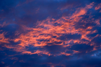 Low angle view of dramatic sky during sunset