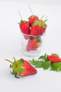 Close-up of strawberries against white background