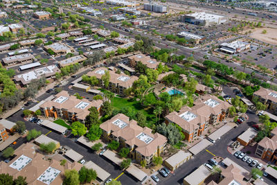 High angle view of street amidst buildings in town