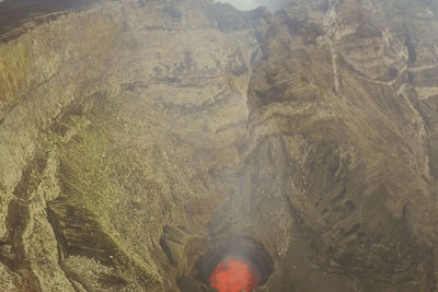 Low section of man standing in water