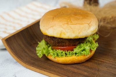 Close-up of burger on table