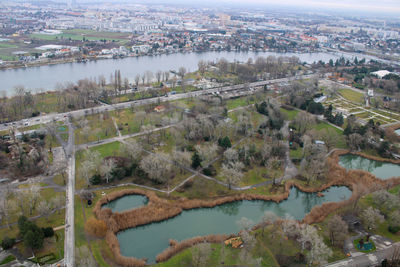 High angle view of river amidst buildings in city
