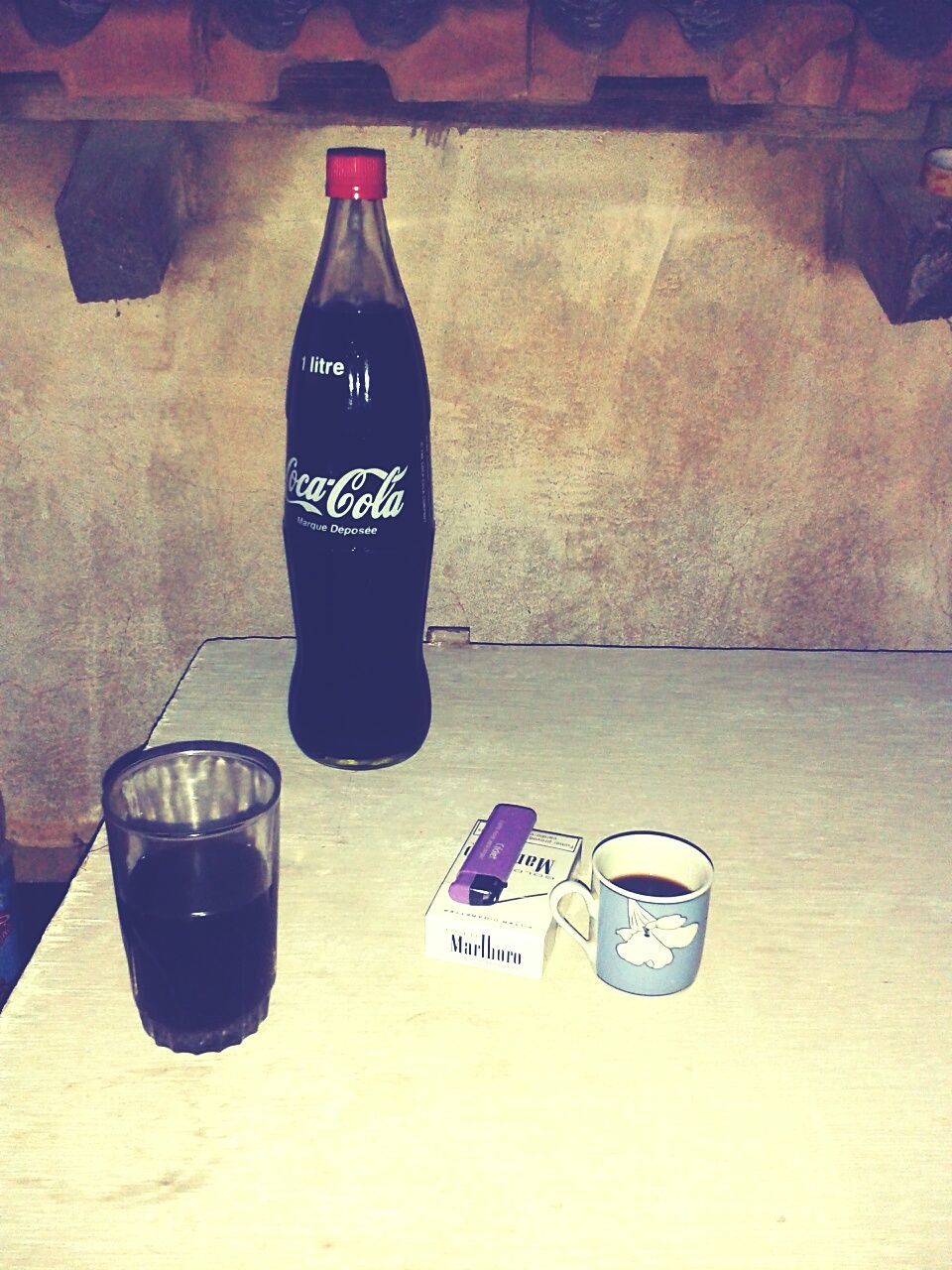 indoors, still life, table, drink, food and drink, text, high angle view, chair, shoe, close-up, absence, refreshment, bottle, wood - material, western script, drinking glass, communication, no people, day, empty