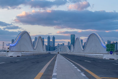 Maidan bridge dubai with dubai skyline