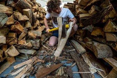 Man working at logs