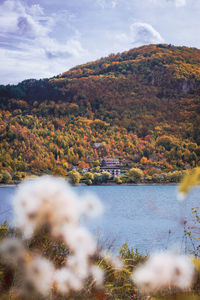 Scenic view of lake against sky during autumn