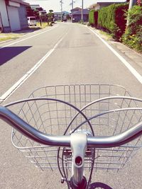 Close-up of bicycle on road