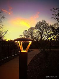 Street light against sky during sunset