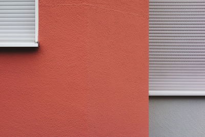 Window on red wall