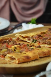 Close-up of pizza served on table