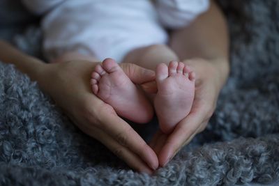 Close-up of couple holding hands