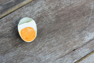 Close-up of egg on wooden table