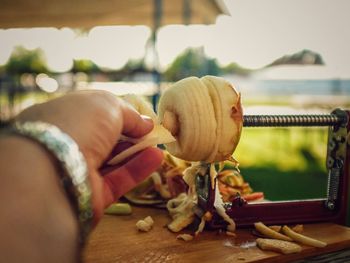 Close-up of person holding food